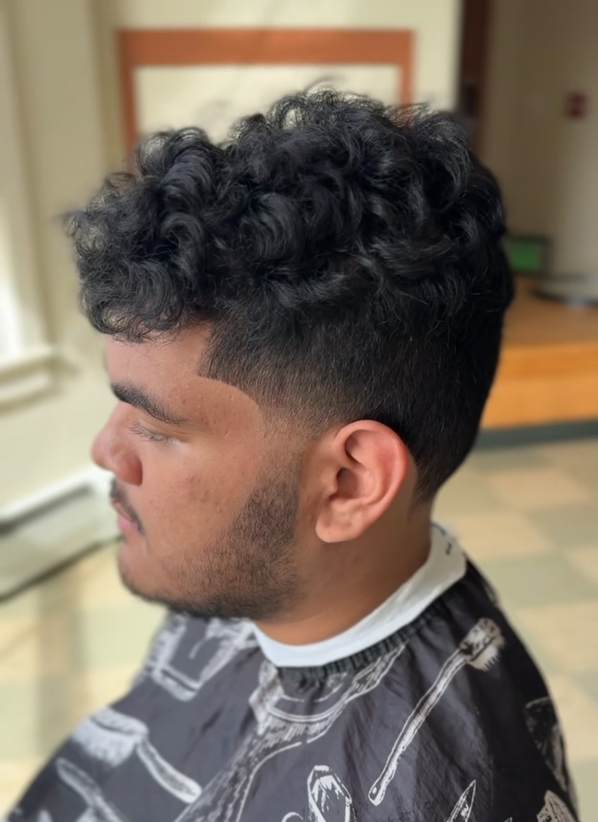 Curly taper with beard detail